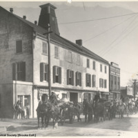 Fire Department parade showing steam engines and hose wagons, 200 block Craven Street, east side, ca. 1900