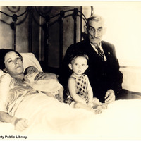 George Isaac Hughes, with his wife and children